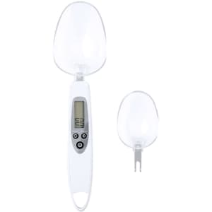 A set of white digital weighing scales with a transparent scoop and a small measuring spoon attachment.
