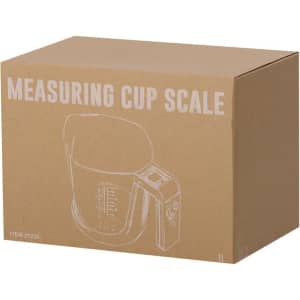 A brown cardboard box featuring a measuring cup scale design, with a handle and display panel.
