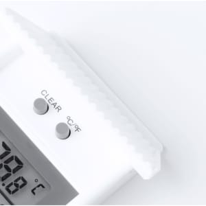 A white thermometer with a digital display and clear buttons for temperature settings.