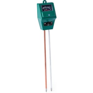 A green soil moisture tester with two probes, featuring an analog gauge for readings.