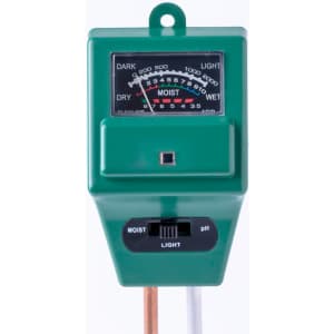 A green moisture meter with a dial and two probes for measuring soil moisture levels.
