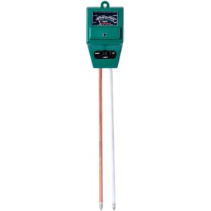 A green soil moisture meter with two probes and a dial gauge for measuring moisture levels.