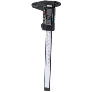 A black digital caliper with a measuring scale and a display screen. It features both metric and imperial measurements.