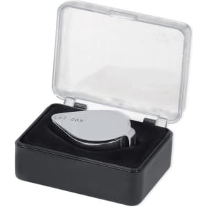 A 20X magnifier in a sleek chrome finish, housed in a clear-top case with a black base and velvet lining.