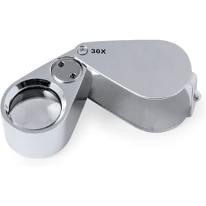 A chrome 30X magnifier with a foldable design, featuring a circular lens and a compact body.
