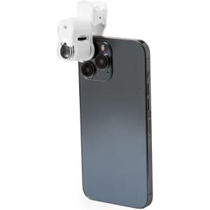 A black smartphone with a white Saganix 60X Microscope attachment on the camera. It has a compact design and modern appearance.