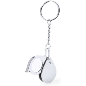 A silver keyring magnifier with an 8X magnification lens, featuring a compact, tear-drop design.
