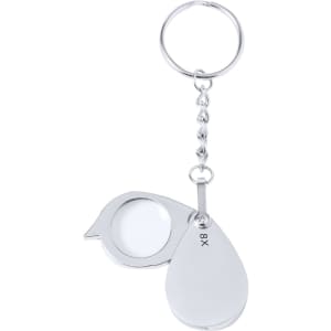 A silver keyring featuring an 8X magnifying glass attached by a chain, designed for easy portability.