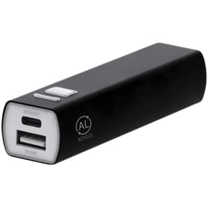 A rectangular black power bank with USB and USB-C ports, featuring a logo and a button.