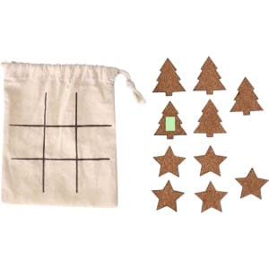 A canvas bag with a game grid and cork game pieces shaped like trees and stars in natural tones.