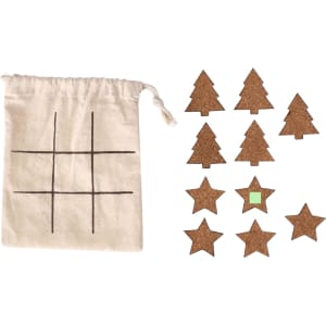 A canvas bag with a grid design and ten cork pieces shaped like trees and stars, including one green star.