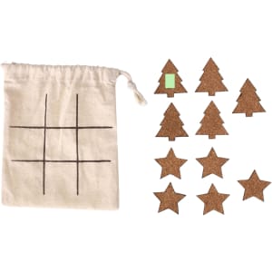 A natural fabric bag with a game board design, alongside cork tree and star game pieces in brown and green.
