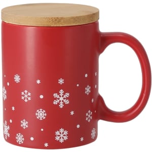 A red coffee mug with a snowflake pattern and a wooden lid, featuring a handle and a sleek design.