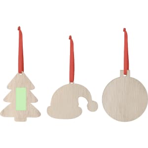 Three wooden Christmas decorations in the shapes of a tree, hat, and circle, each with red ribbons for hanging.