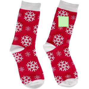Red socks adorned with white snowflakes, featuring a white cuff and a branding area.