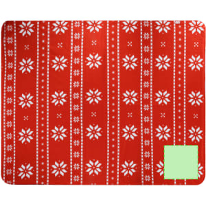 A red blanket featuring white snowflake patterns and horizontal stripes, with a green square in one corner.