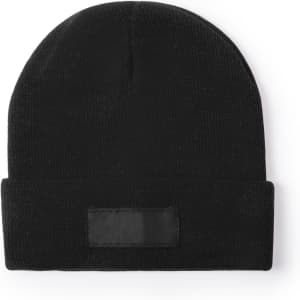 A black beanie hat featuring a fold-over cuff and a logo patch.