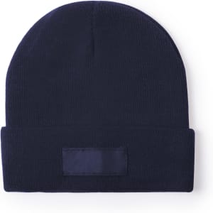 A navy blue beanie hat with a folded brim and a blank patch for branding.