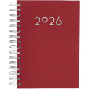 A red spiral-bound diary with silver metallic lettering for the year 2026 on the front cover.