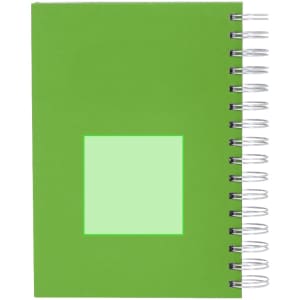 A green spiral-bound diary with a blank square on the front cover and a silver coil spine.