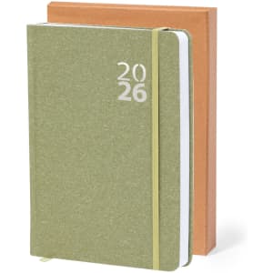 A green diary with the year 2026 on the cover, nestled behind an orange diary. Both have a sleek design.