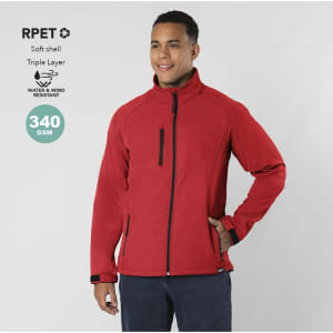 A red soft shell jacket with a zippered pocket and a logo, featuring a sleek, modern design.