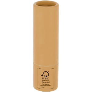 A tan lip balm tube with a branding logo, featuring a recyclable material designation.