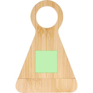 A bamboo bottle opener in a triangular shape with a circular hole and a green patch. Features a logo.