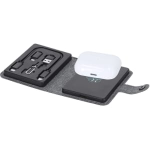 A grey wireless charger set with multiple cables and an accessory case, featuring a modern design and a logo.