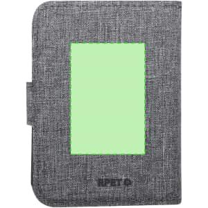 A grey fabric wireless charger with a green accent and a logo on the front.