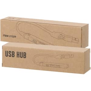 Two brown cardboard boxes containing a USB hub, featuring multiple ports and a USB connector. Each box has a logo.