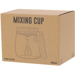 A mixed colour box featuring a transparent mixing mug with a whisk attachment. The box has a logo and item details on it.