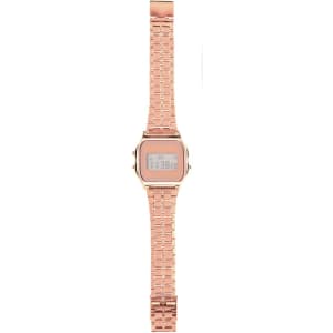 A rose gold digital watch with a rectangular face and a metallic link bracelet. It features a logo on the dial.