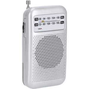 A silver portable radio with an antenna, featuring FM and AM tuning dials and a speaker grille.