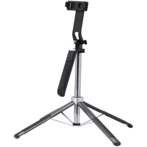 A black and silver adjustable phone stand with a tripod base and a holder for devices. It includes a logo.