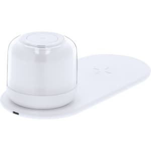 A white wireless charger lamp with a rounded top and a flat base, designed for charging devices.