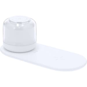 A white wireless charger lamp with a rounded top and a flat base, featuring a logo on the surface.