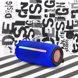 A blue cylindrical speaker featuring a colourful strip, set against a patterned background.