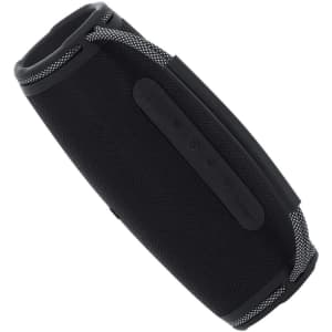 A black portable speaker with mesh accents and control buttons on one side. It features a smooth, cylindrical design.