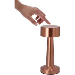 A copper lamp with a sleek, modern design, featuring a cylindrical base and a round top.