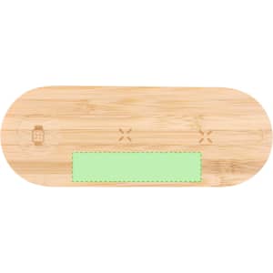 A bamboo wireless charger in a light colour with a green accent and a logo on the surface.