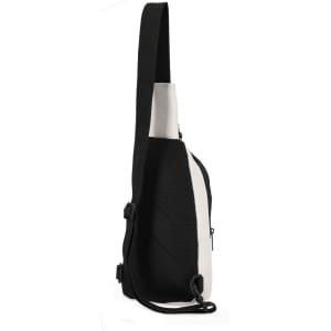 A sleek shoulder bag featuring black and white colours, with a mesh panel and an adjustable strap. It has a logo.