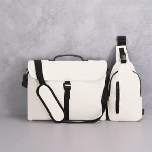 A white laptop bag with black straps and a smaller matching sling bag, both featuring sleek designs.