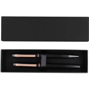 A sleek black gift box containing two metal pens with rose gold accents. The box has a smooth black interior.