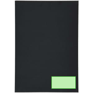A black notebook with a green label on the bottom right corner and a smooth, matte finish.