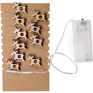 Decorative wooden reindeer lights on a cardboard backing, featuring a battery pack and clear string.