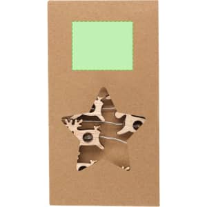 A star-shaped box containing wooden decorations in a natural finish. Box is brown with a green label area.