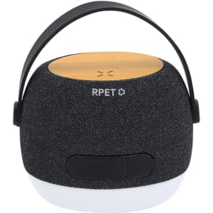 A round, black speaker with a bamboo top and a handle, featuring a logo and a control panel on the side.