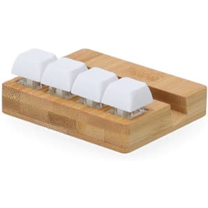 A bamboo phone stand featuring four white holder pieces, designed for stability and organisation.