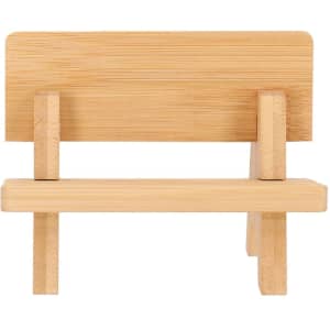A bamboo phone stand featuring a minimalist design with a natural finish and a sturdy structure.